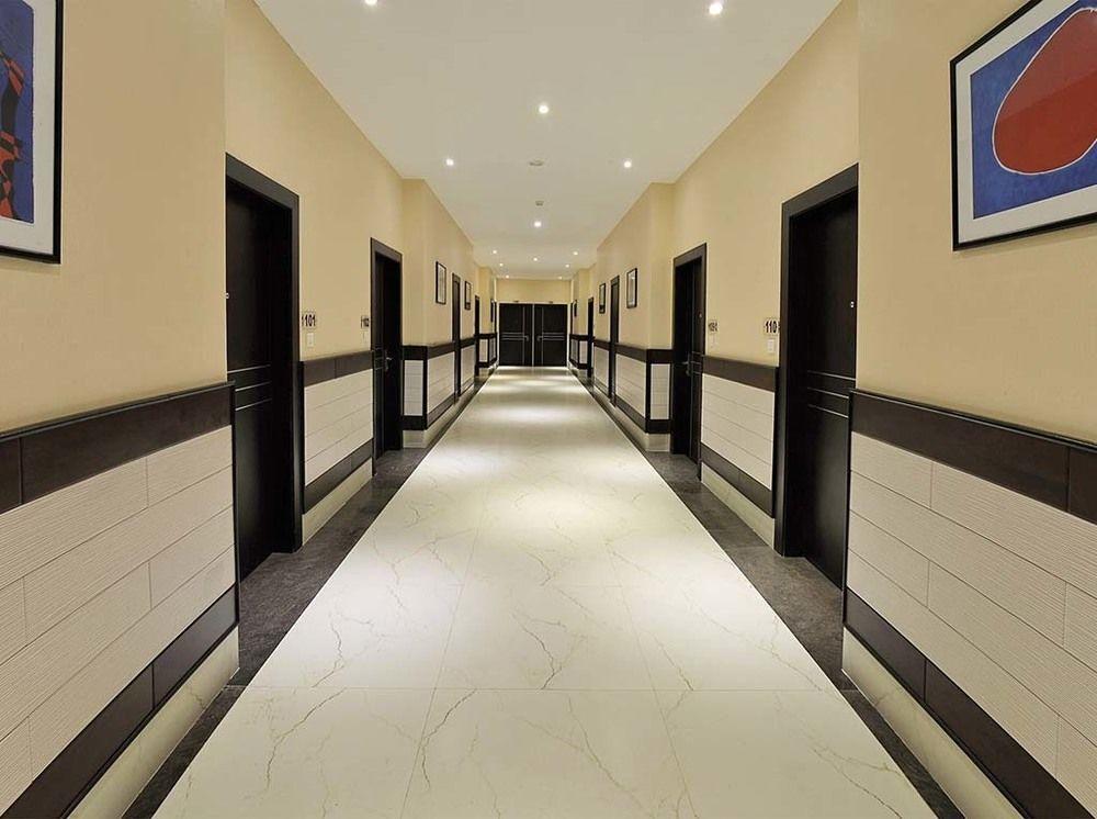 Poppys Hotel Мадурай Экстерьер фото
